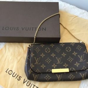 Retired Louis Vuitton Monogrammed PM Clutch